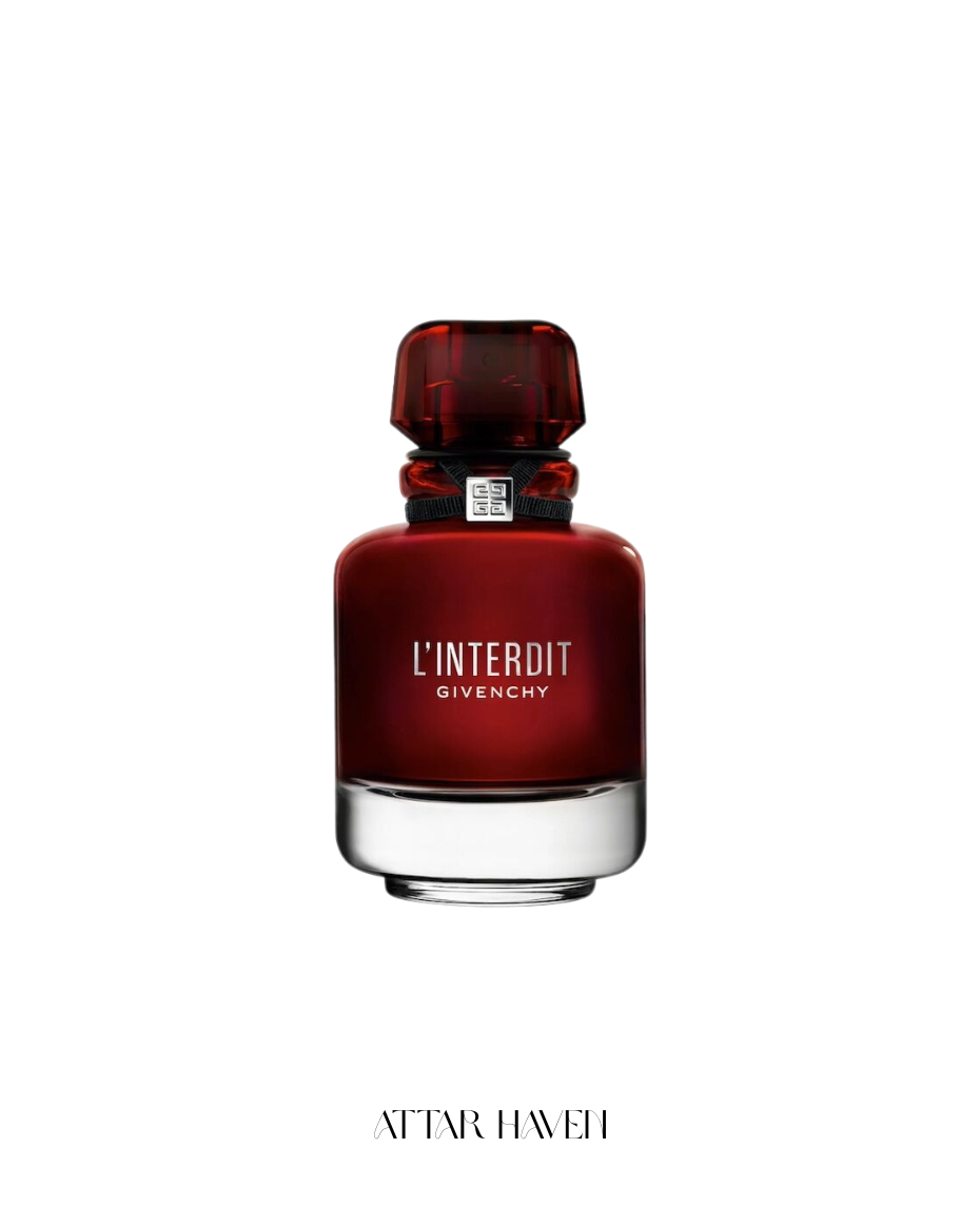 A bottle of Givenchy L'Interdit perfume with a deep red translucent body and cap, set against a plain white background with 'ATTAR HAVEN' printed below.